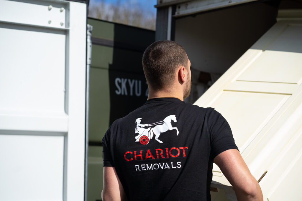 Chariot mover is loading truck from the storage